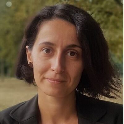 http://Headshot%20of%20Marija%20Balskovic%20from%20the%20chest%20up,%20smiling%20in%20black%20blazer.